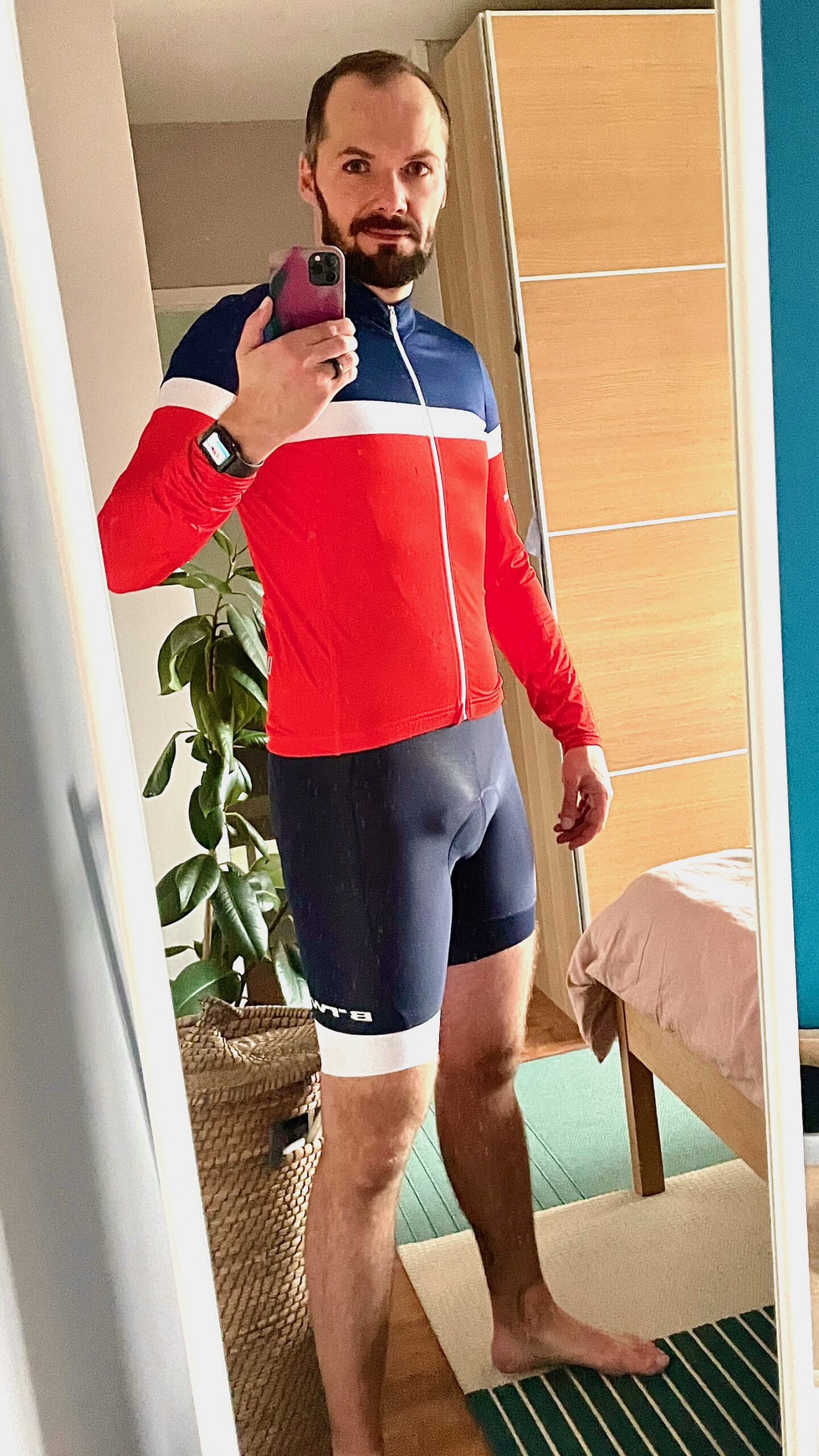 Switch in Sportful carbon and red jersey with plain black lycra cycle shorts